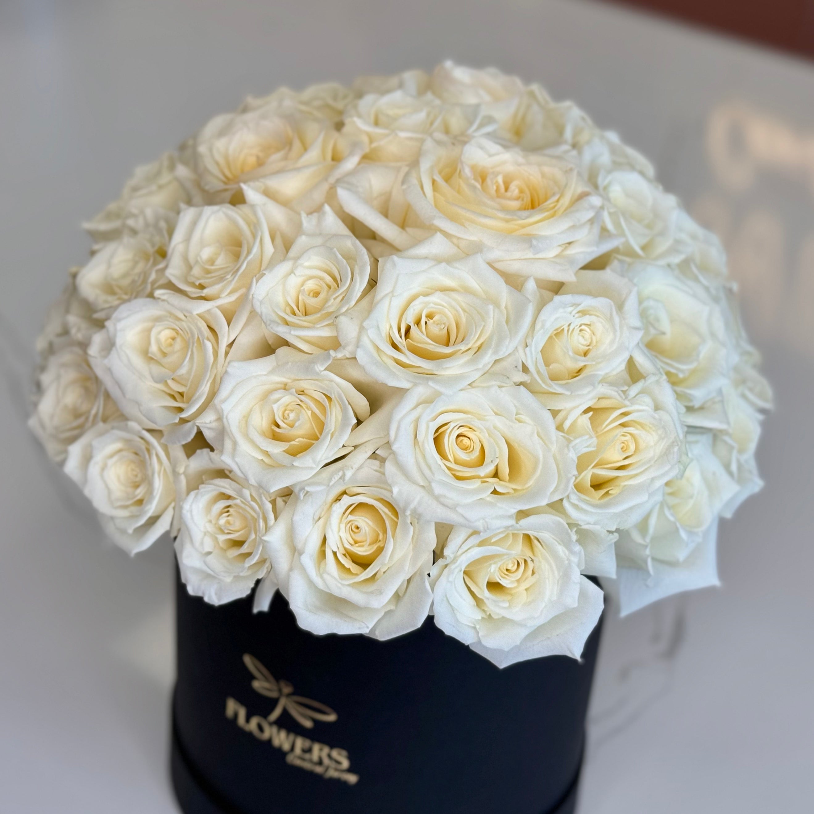 White Roses in Black Signature Flower Box