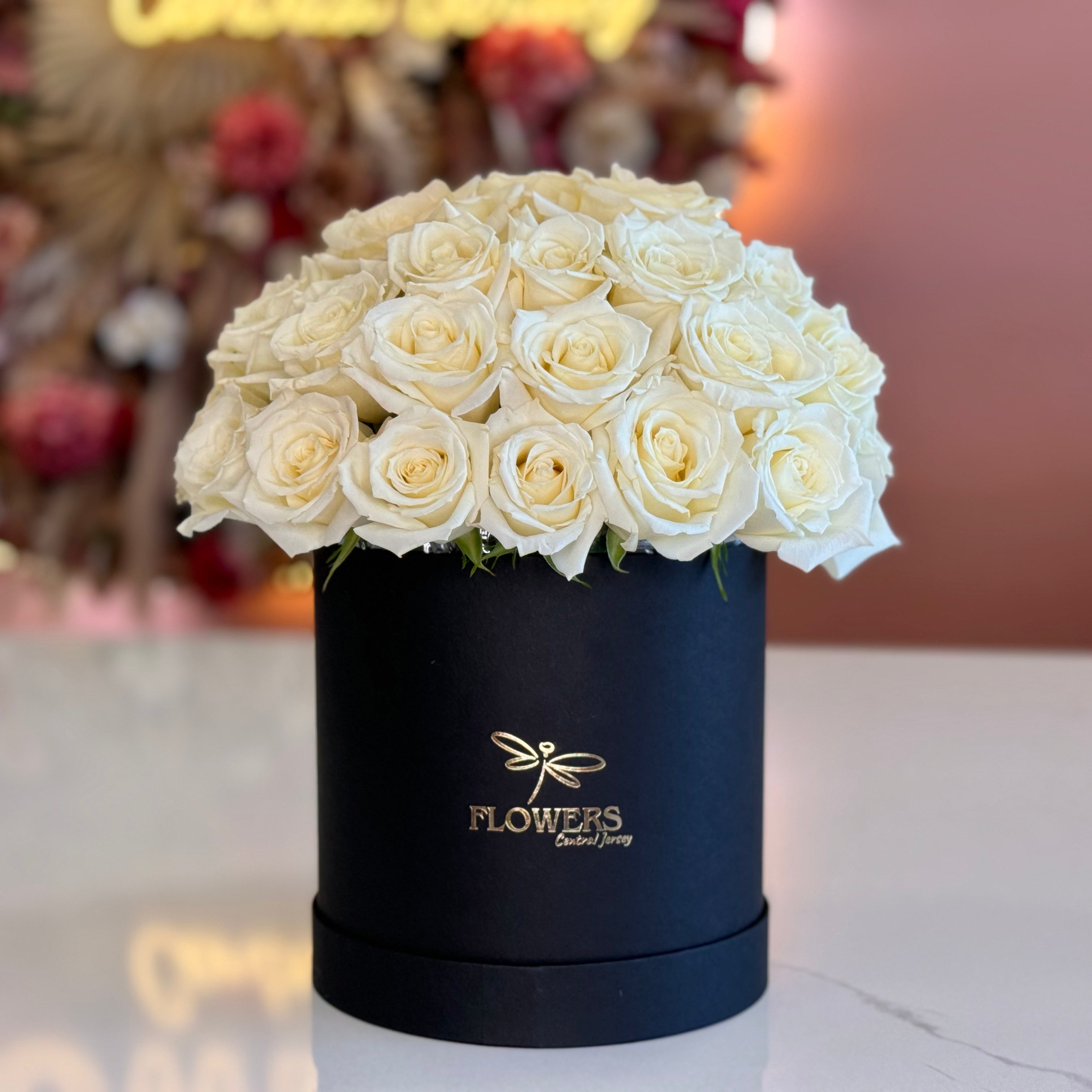 White Roses in Black Signature Flower Box